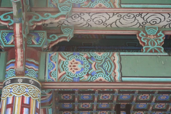 Layered painted brackets and beams