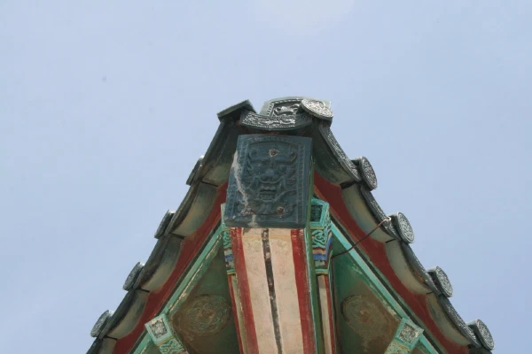 The roof gable against the sky