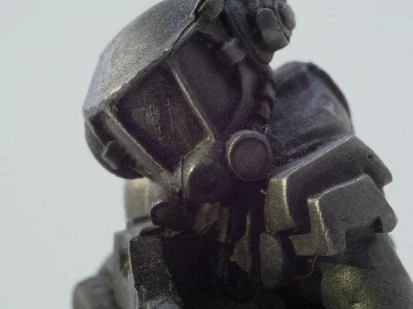 Macro of the figure's helmet