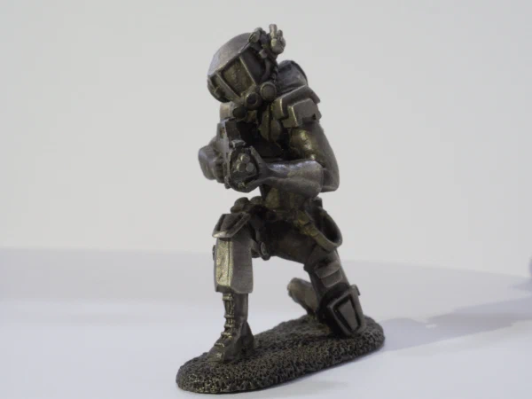 The armored figure kneeling
