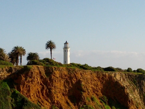 A lighthouse on a coastal bluff