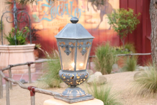 A lantern against a red wall